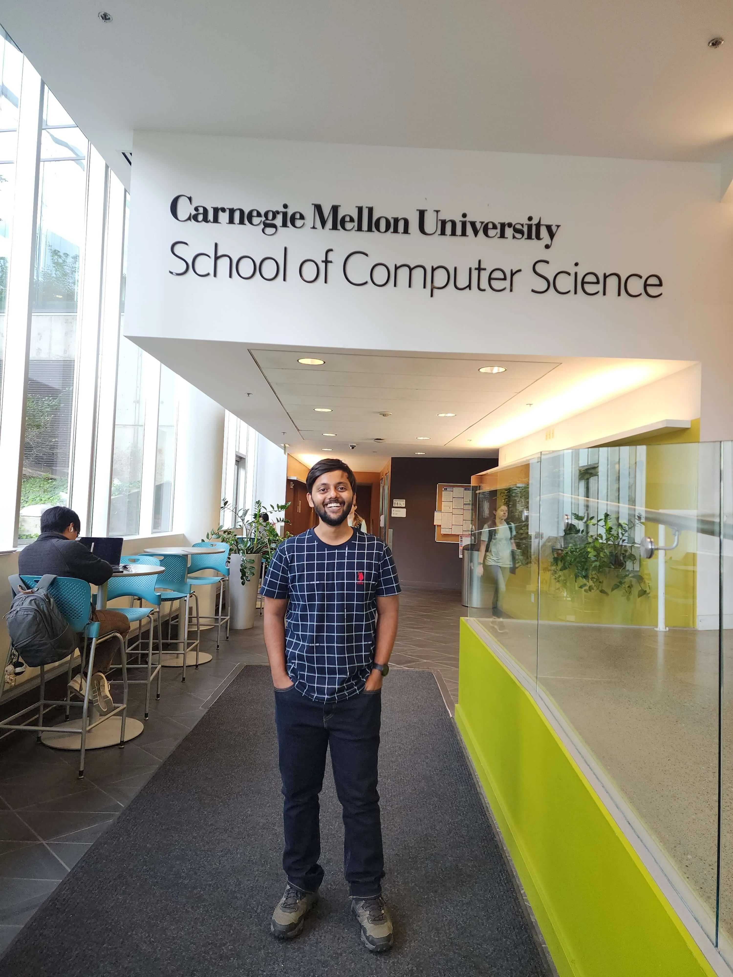 Me smiling in SCS department of Carnegie Mellon University